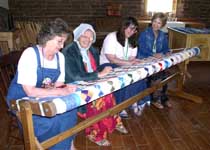 New Mexico quilters working on a quilt