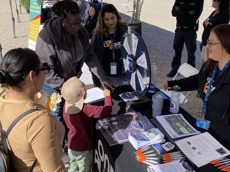 Child spinning ACS prize wheel