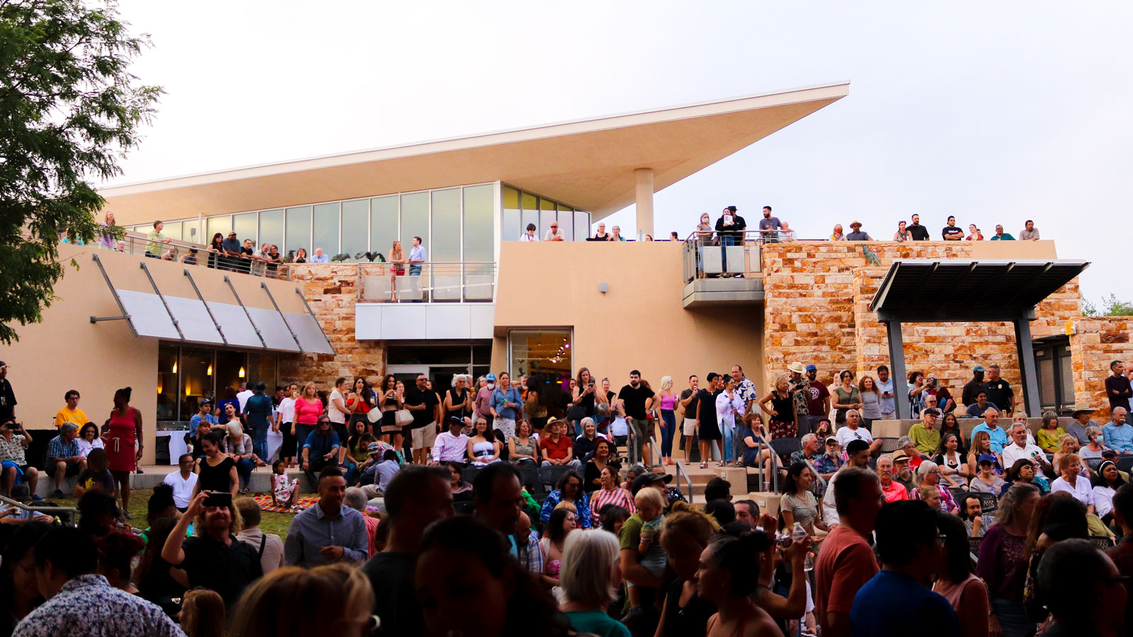 A crowd of visitors in the Albuquerque Museum Amphitheater