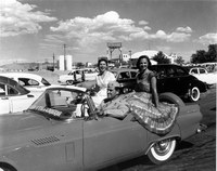 La Reina Charlotte Goodwin (right) and La Princesa Maxine Hill at the Albuquerque Airport.  Albuquerque's 250th Anniversary, 1956.  Milo Crawford Collection, 1994.12.1.