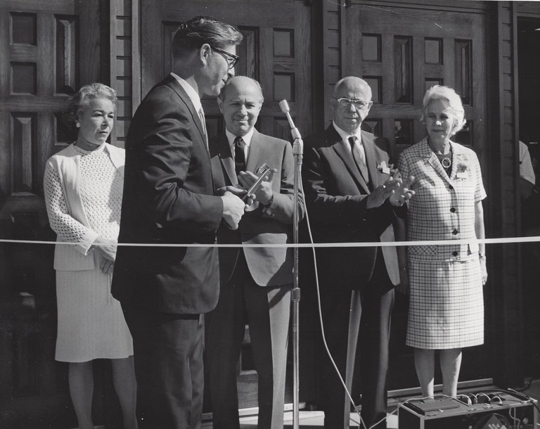 Ribbon cutting for American Furniture store at Menaul and Carlisle in 1968 with Pete Domenici in front of (from left to right): Frieda Blaugrund, wife of E. Mannie; E. Mannie Blaugrund; Henry Blaugrund; Ruth, wife of Henry. 