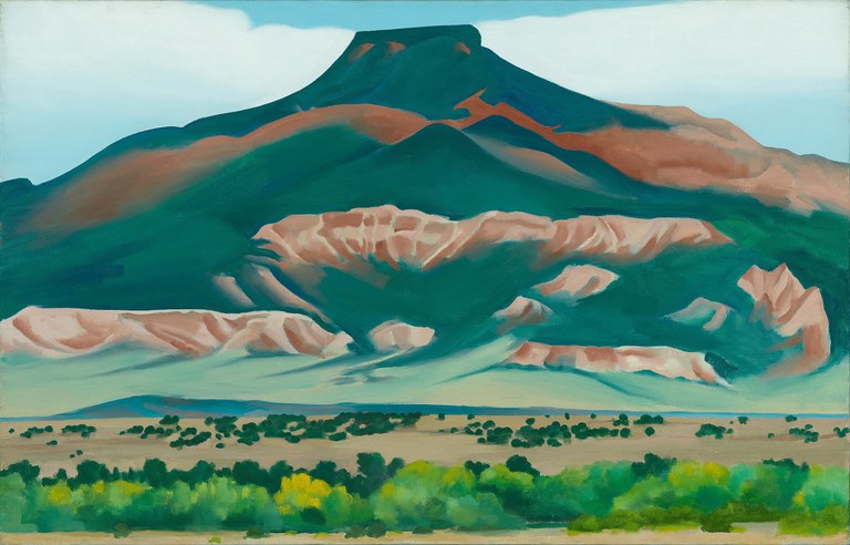 An oil painting by Georgia O’Keeffe featuring a mountain in teal in browns in the background and a desert-scape in the foreground with green shrubs and plants. Artwork Details: Georgia O’Keeffe, Pedernal, 1941. Oil on canvas. Georgia O’Keeffe Museum, Gift of the Georgia O’Keeffe Foundation, 2006.5.172. © 2022 Georgia O’Keeffe Museum / Artists Rights Society (ARS), New York.