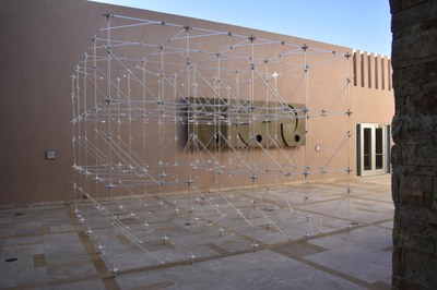 Ronald Rael, Glass Scaffold Glass Scaffold by Ron Rael, composed of clear glass rods connected together in a scaffold-like structure, installed in the Albuquerque Museum's East Atrium.