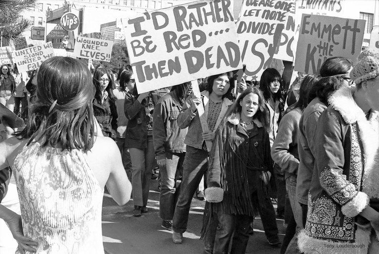 Anthony Louderbough, Demonstrator Holds Sign Reading, “I’d Rather Be Red than Dead”