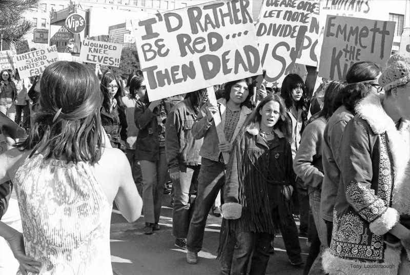 Anthony Louderbough, Demonstrator Holds Sign Reading, “I’d Rather Be Red than Dead”
