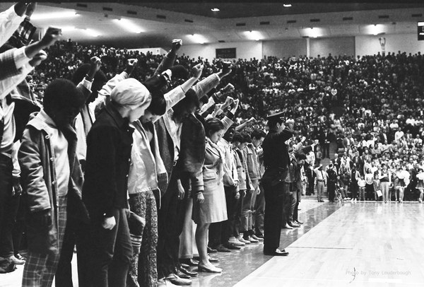 Anthony Louderbough, University of New Mexico Students Give Black Power Salute during the US National Anthem Seven Generations 2020