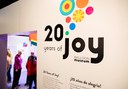 20 Years of Joy Exhibition - Logo Wall