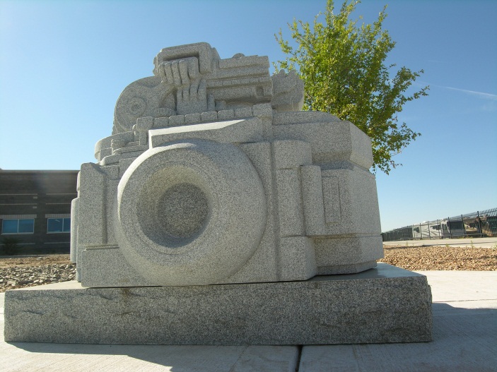 A statue of a camera