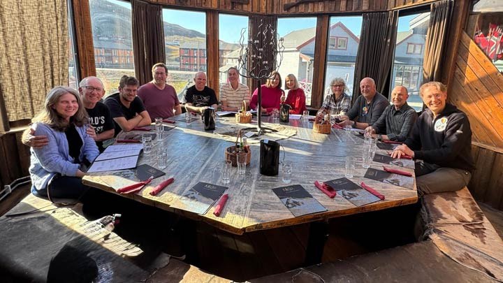 BM-Polar-Exhibition-(LOG-6-22-26)-web45b The Polar Expedition team taking a group photo at a local restaurant after completing their mission.