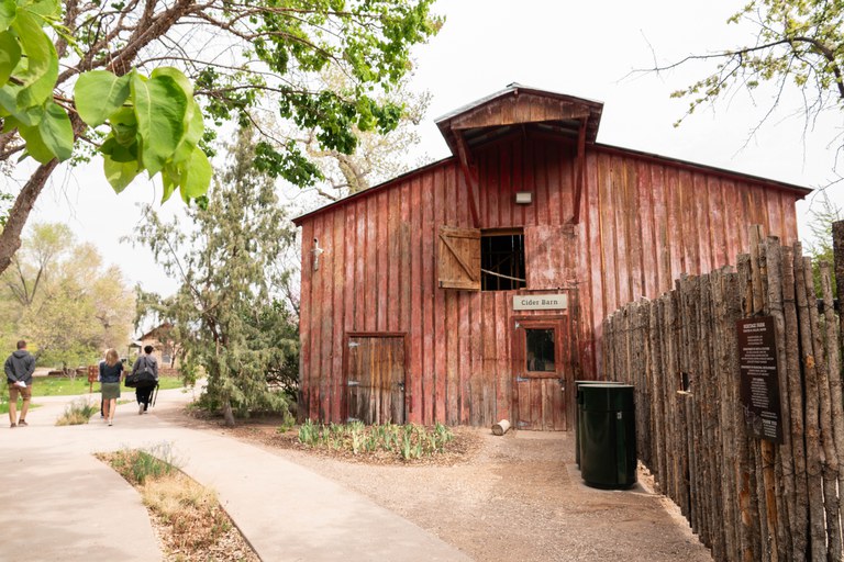 The refurbished cider barn greets visitors as they enter Heritage Farm through a new, paved entry way.