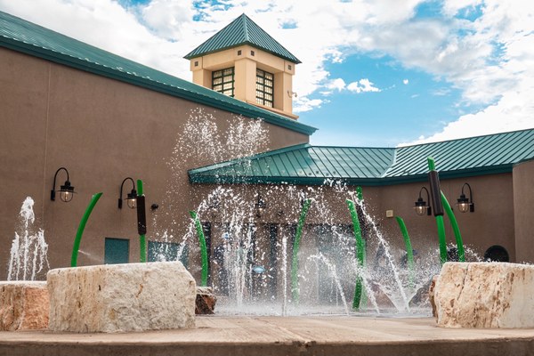 A spray pad with all of the water features spraying water at the same time.
