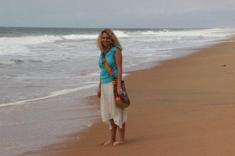 Tina Deines on the beach in the Ivory Coast during 2017 Abidjan trip.