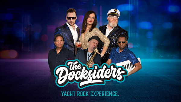 Five musicians posing together with instruments against a city nightscape background, featuring The Docksiders logo and Yacht Rock Experience.
