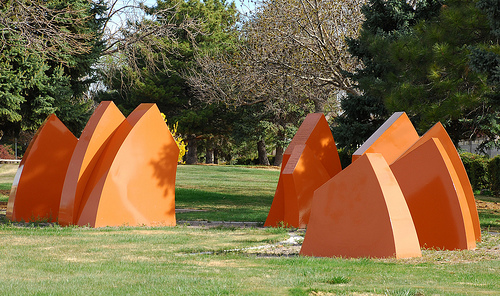 Series of abstract, orange sculptures located in the San Mateo Mini Park.