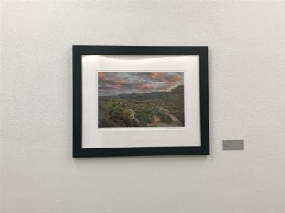 Landscape photograph with a white mat and black frame.