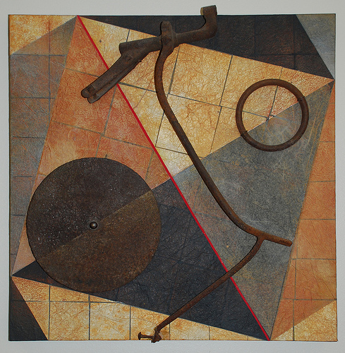 Abstract assemblage with right angles and circles in various earth tones.