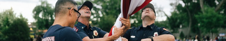 Firefighters Raising Flag