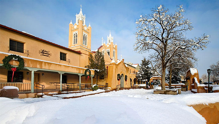 San Felipe de Neri Church in Old Town Albuquerque after a snow storm.