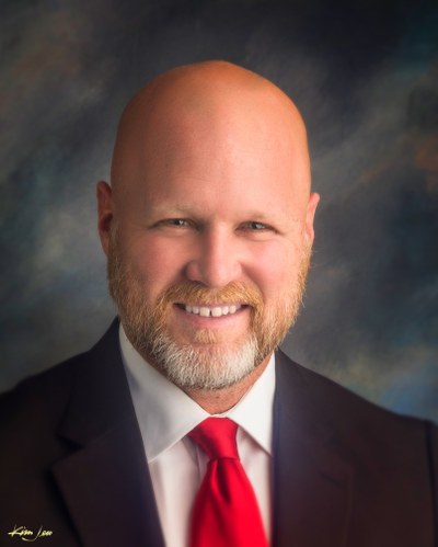 Headshot of Councilor Champine