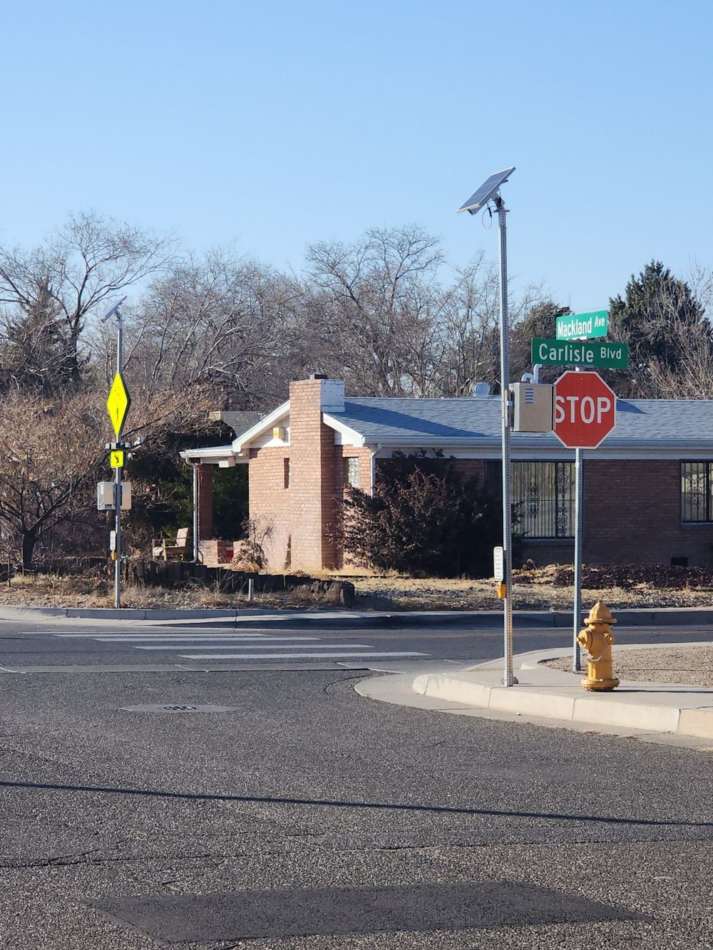 Photo of new pedestrian crosswalk at Mackland AV and Carlisle Blvd