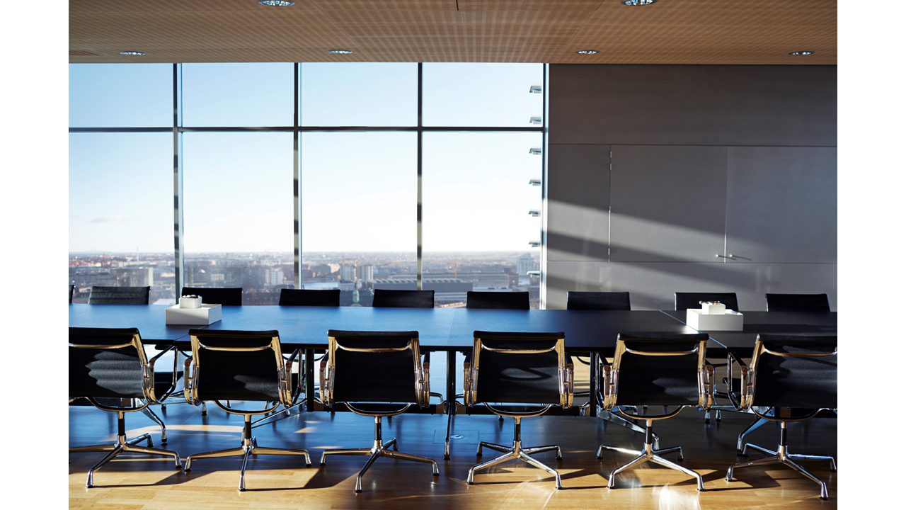 Meeting room with empty chairs