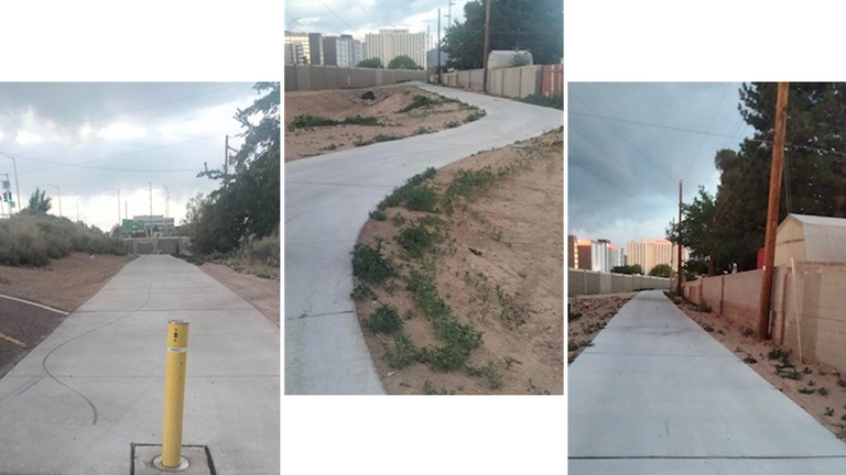Image of the Tom Bolack Trail extension June 2025 after new concrete path was installed where trash and debris once were.