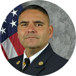Headshot of Interim Fire Rescue Chief Gene Gallegos