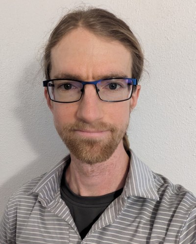 A headshot of Anthony Garland.