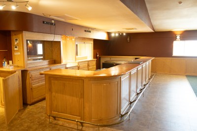 A bar with counters behind it.