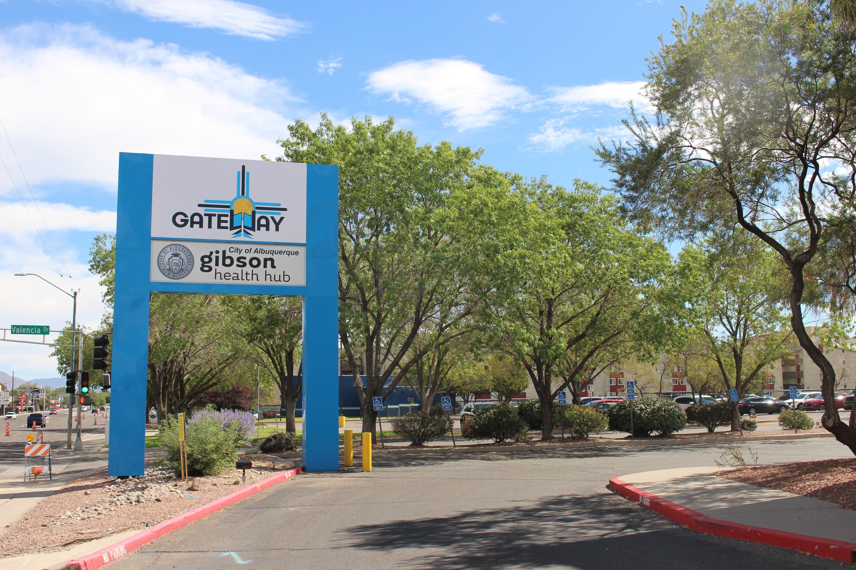 A tall freestanding sign reading: "Gateway" and "Gibson Health Hub" underneath