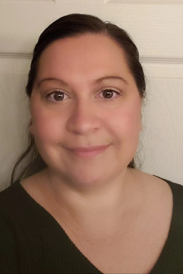 Laura Smith wearing a black shirt.