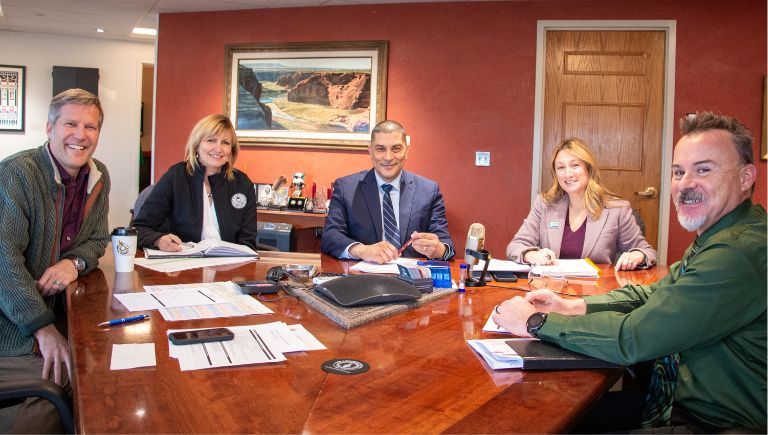 Mayor Keller and his leadership team in a conference room.