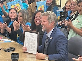 Mayor Keller and Nicole Rodgers at the signing of the Safer Space Ordinance.