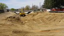 Removing concrete lining east of comanche bridge