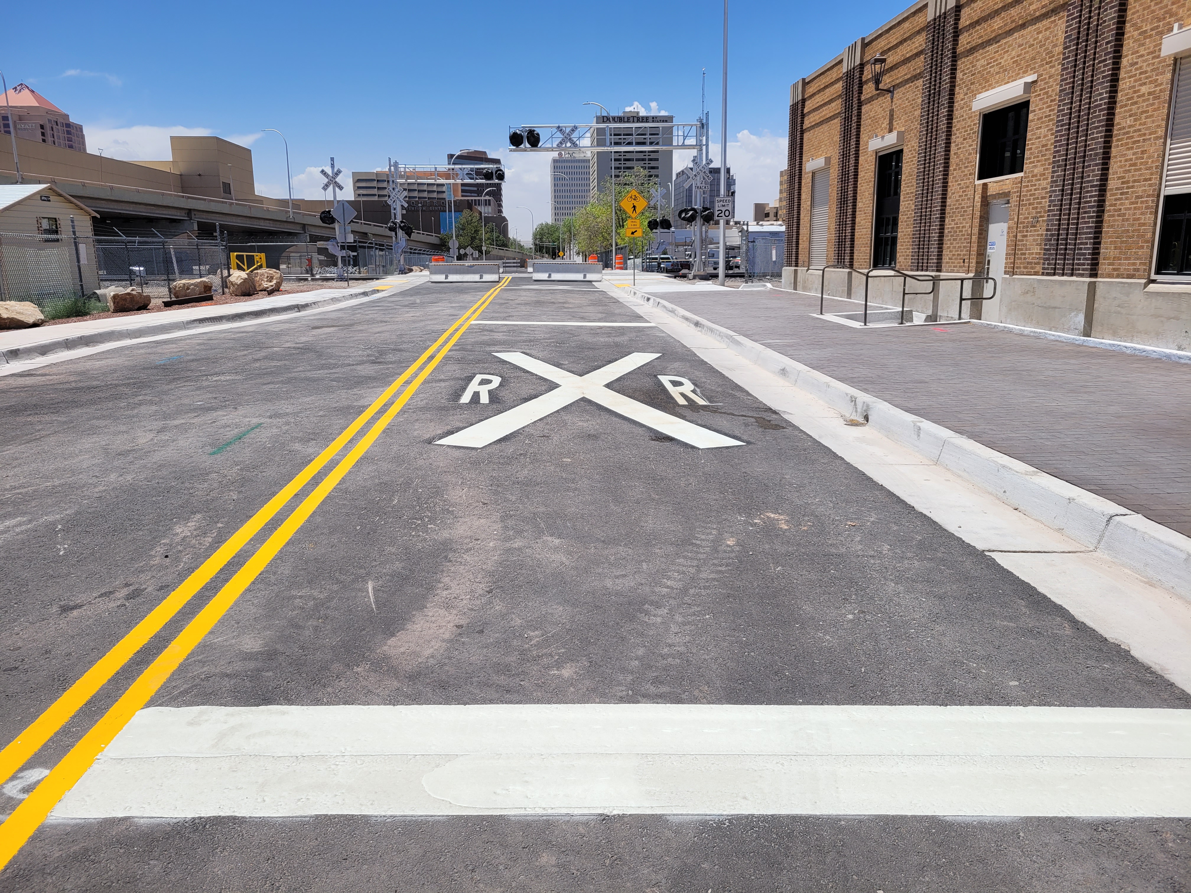A photo of a downtown Albuquerque street crossing.