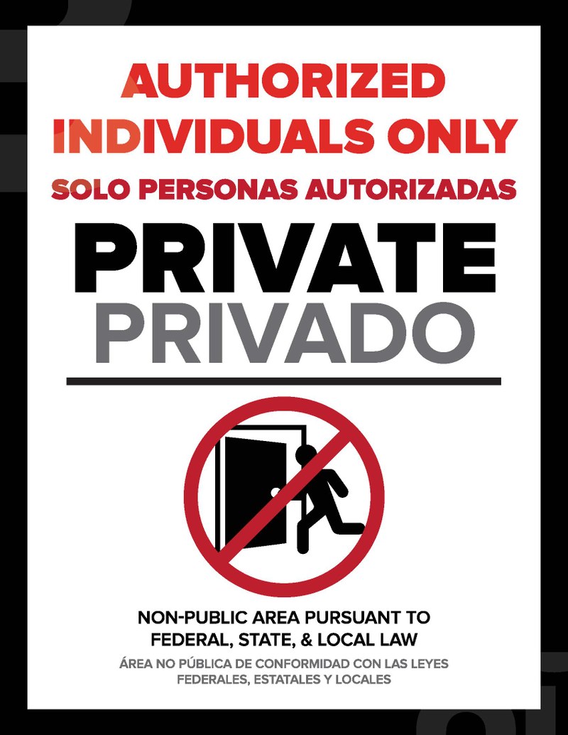 safer spaces sign bilingual