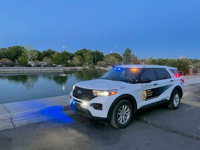 This is a photo of a metro security vehicle with its lights on around dusk.