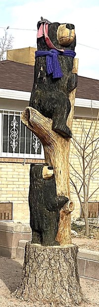 Fairwest Bear artwork wood carved sculpture.