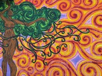 A wall mural painting of a woman with bark-like skin and flowing green hair, emulating a tree, and a colorful, spiraling pattern of yellow and red in the background.