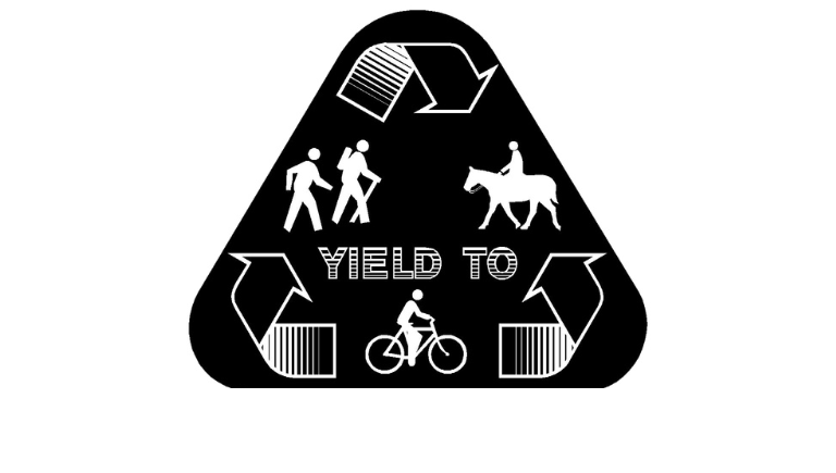 A black yield sign showing that bicycles yield to horses and pedestrians, and pedestrians yield to horses.