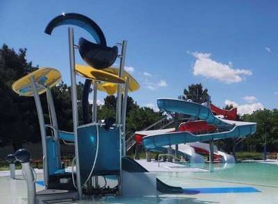 View of new slide and water features at West Mesa Aquatic Center.