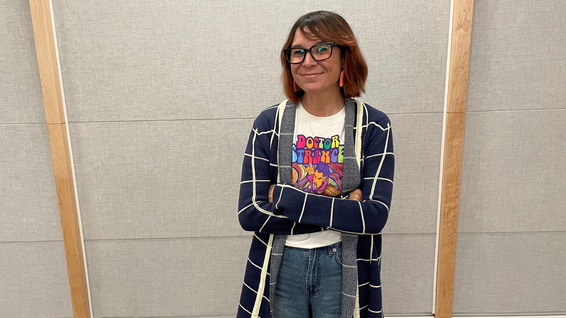 The humble Tetris champion smiles, pleased with her victory.