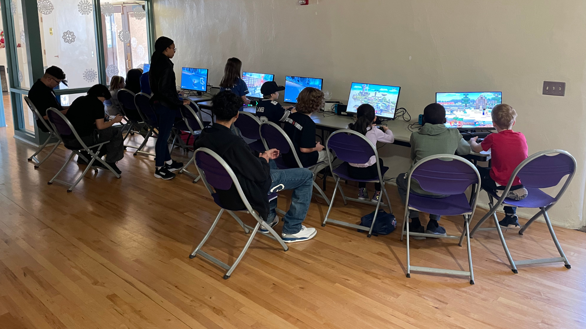The gamers gathered together to race in Mario Kart!