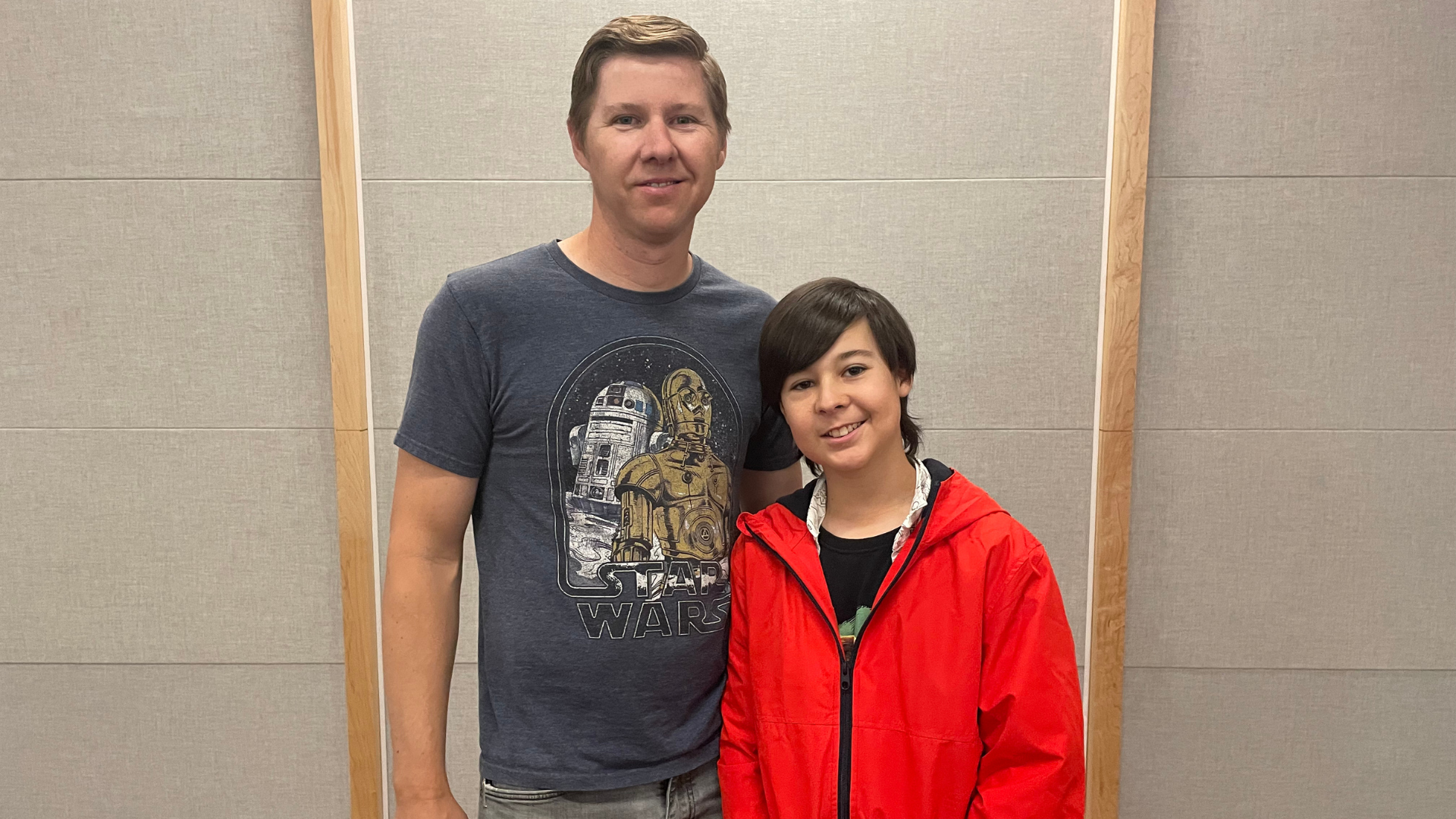 Father and son duo win Smash Bros teams and pose for the camera!