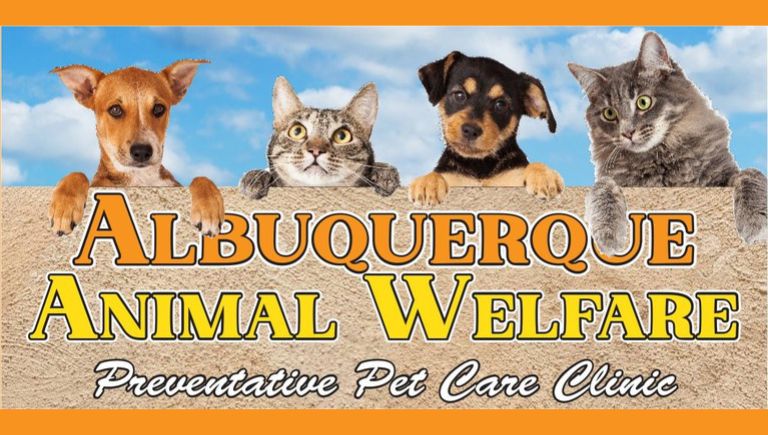 Two cats and 2 dogs looking over a wall that says Albuquerque Animal Welfare Preventative Pet Care Clinic.