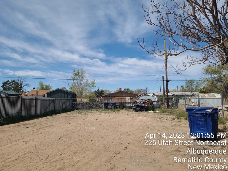 A clear residential lot after the dilapidated structure was demolished.