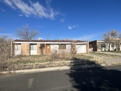 A dilapidated house in need of repairs.
