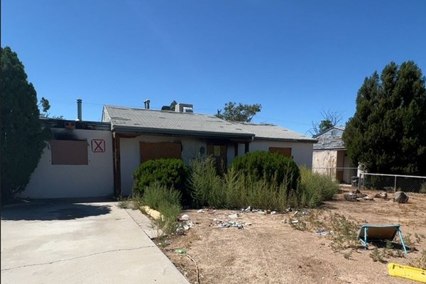 A dilapidated structure in need of repairs or demolition.