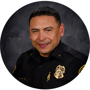 A headshot of Deputy Chief George Vega .