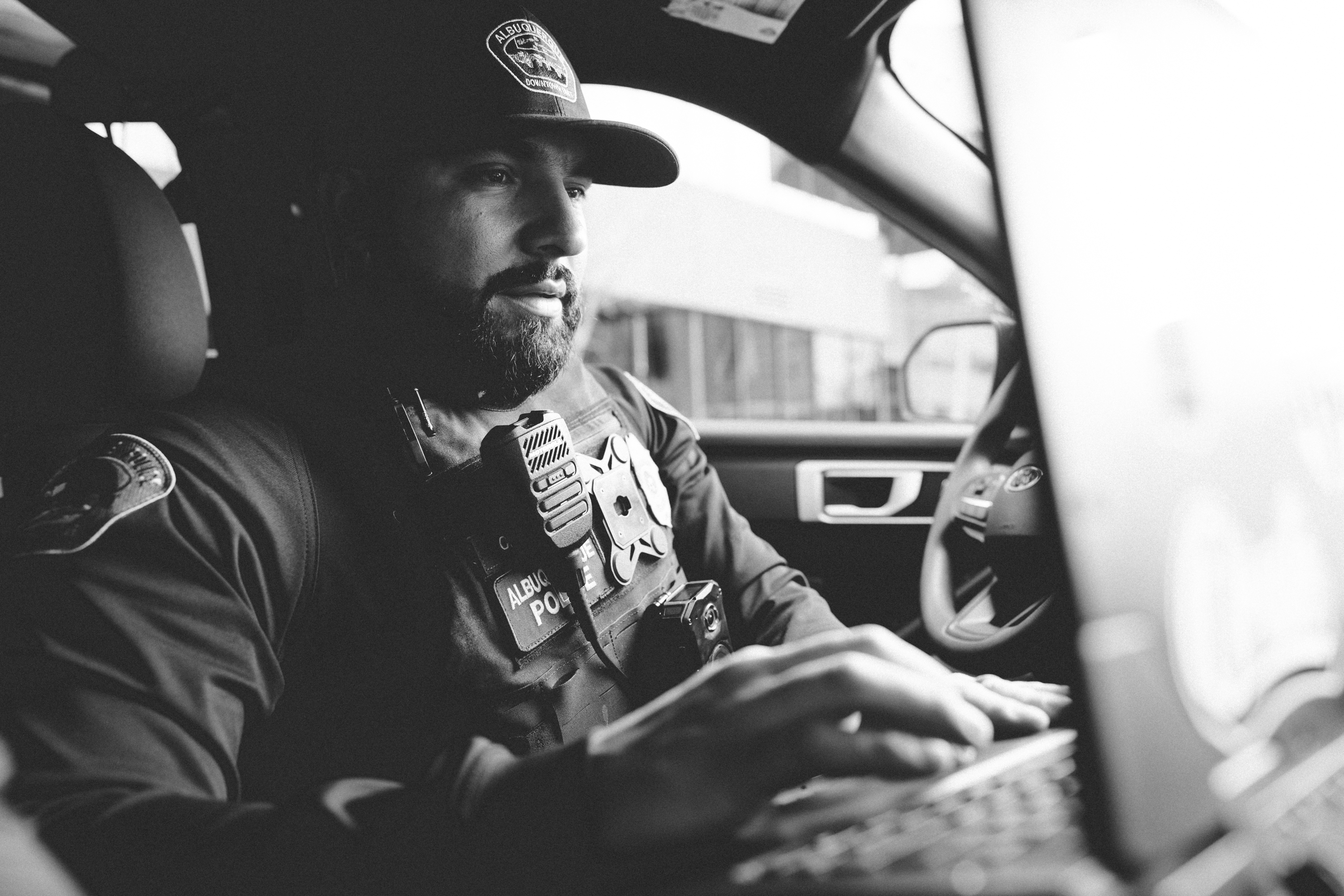 Police Officer working in his unit